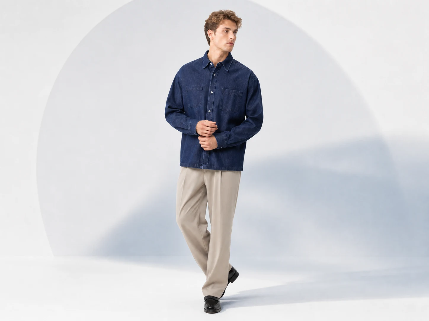 Male model wearing a dark indigo custom denim overshirt