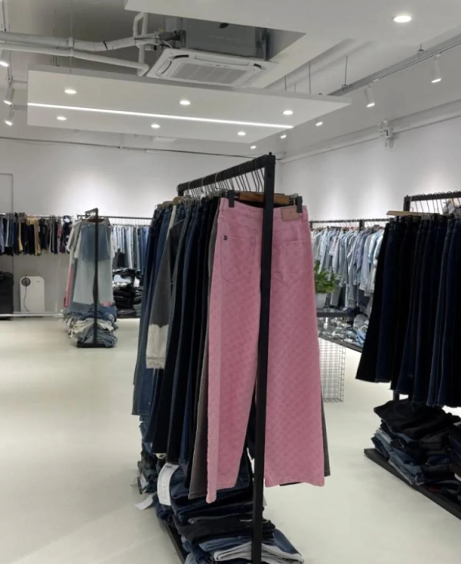 Beilin Denim showroom displaying custom denim samples in Foshan, China