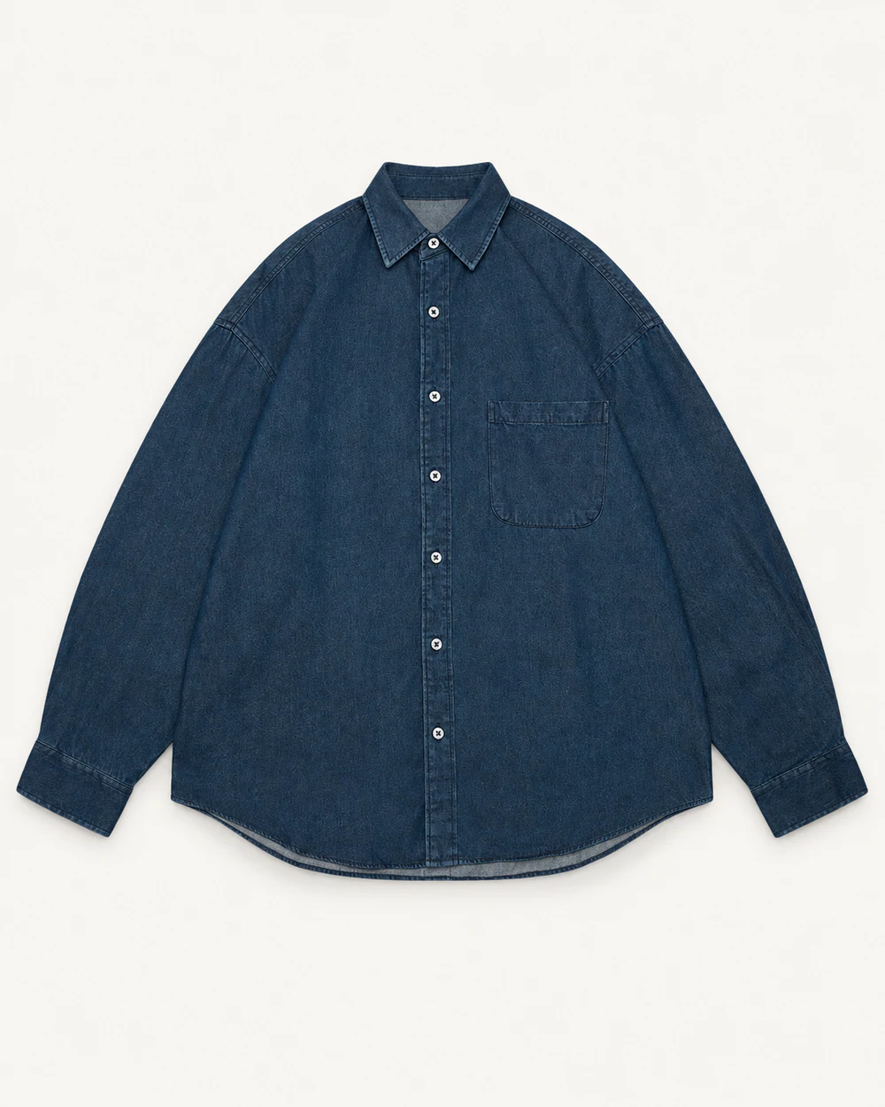 Dark indigo oversized denim shirt with drop shoulders and single chest pocket