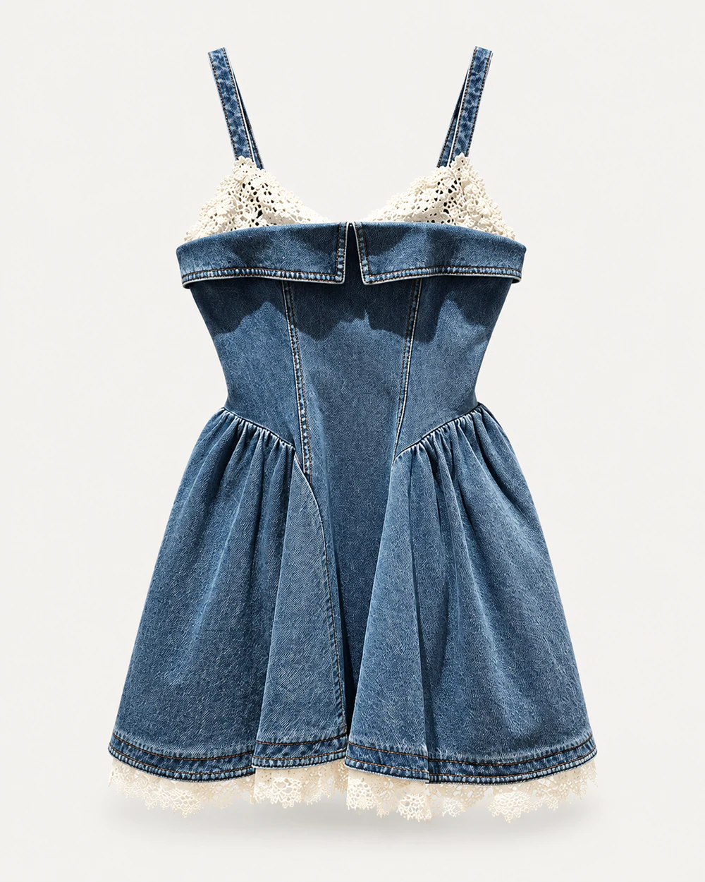 Medium-wash corset denim mini dress with white lace bust and hem trim
