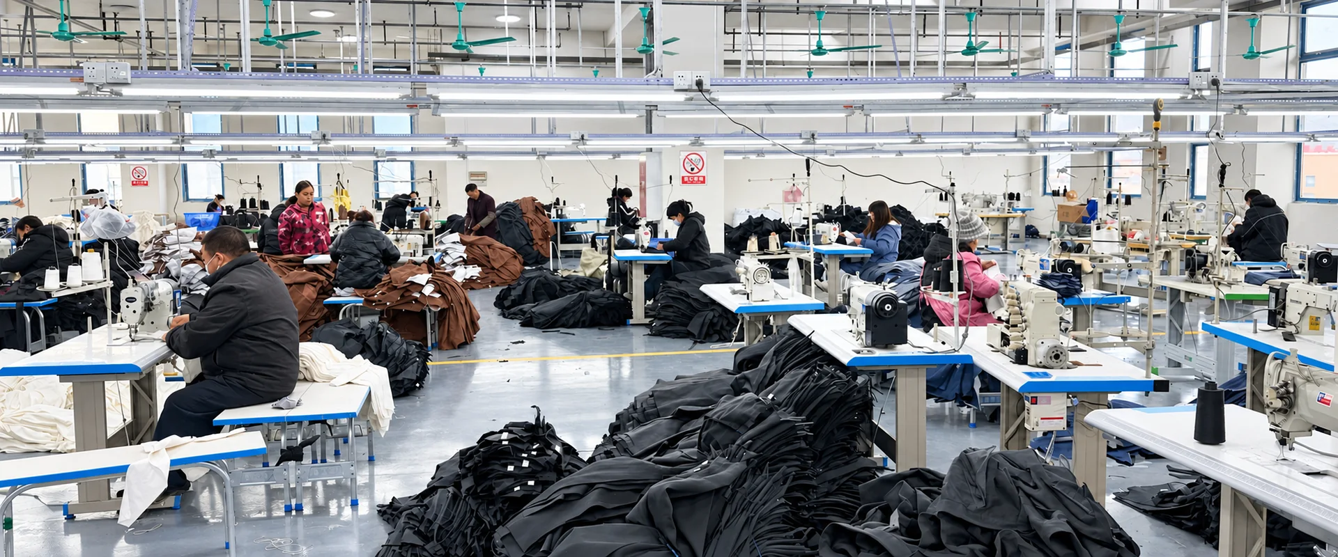 Wide view of Beilin Denim sewing workshop during denim garment production