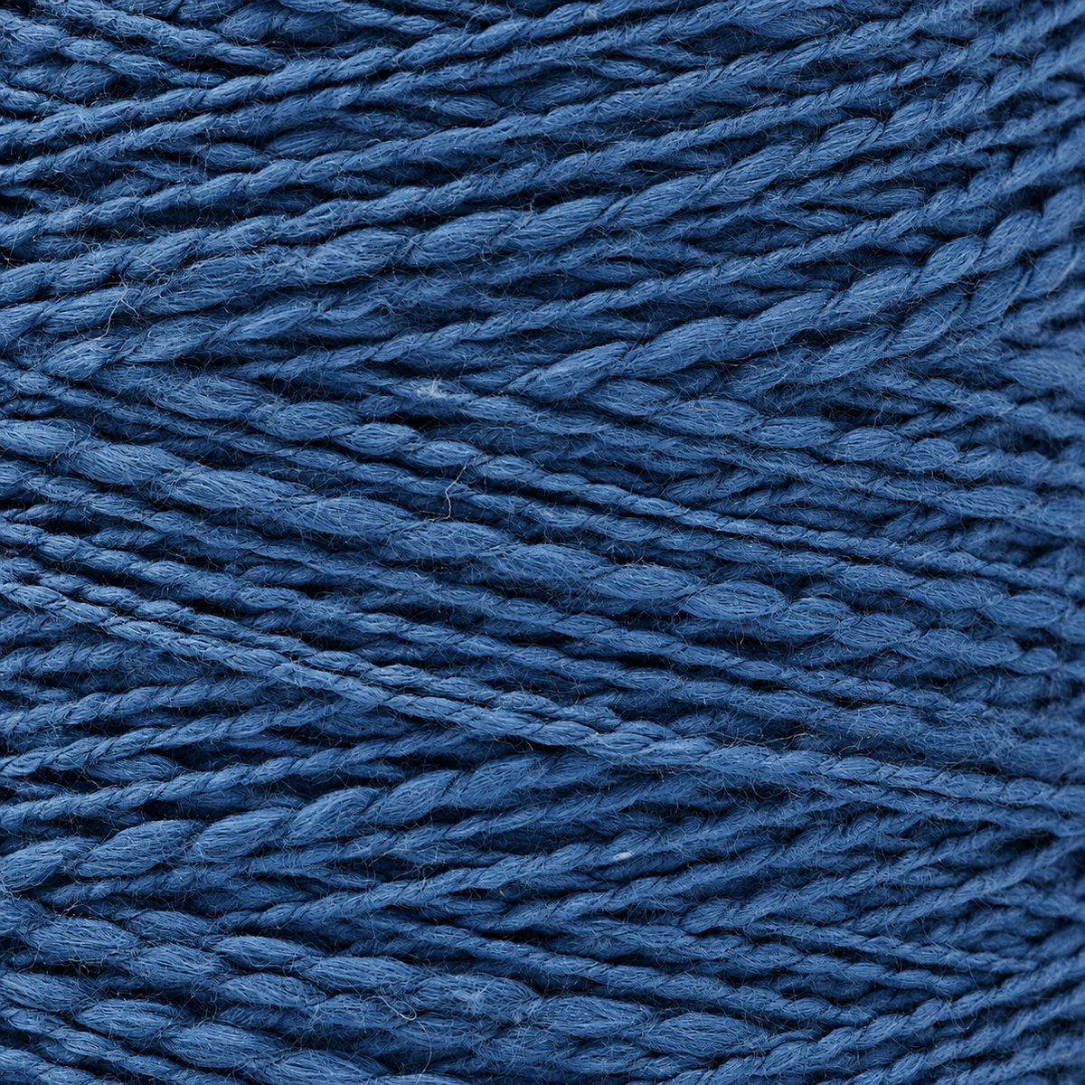 Close-up of blue slub yarn with natural thickness variation