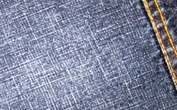 Slub denim fabric reference showing irregular streaks and yarn variation