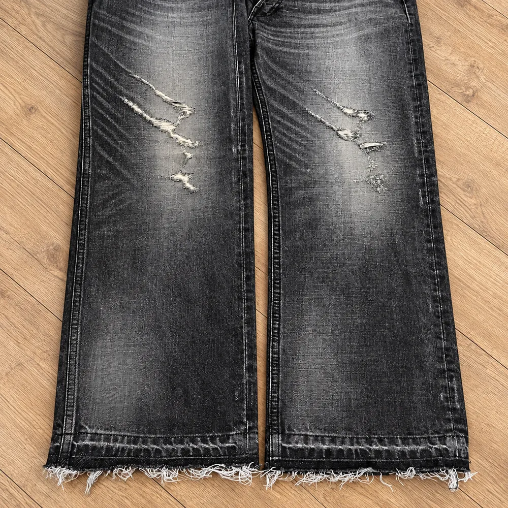 Black washed denim jeans used as an approved wash appearance reference