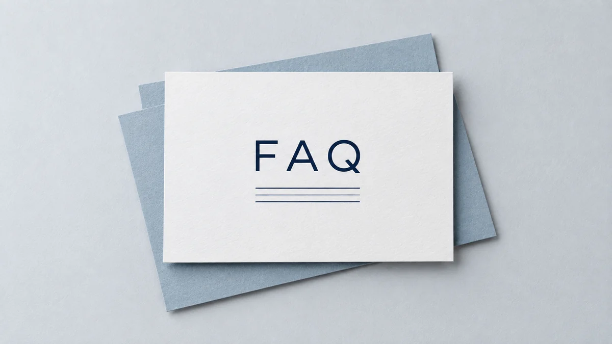 Minimal FAQ card with an FAQ label on layered blue-grey paper